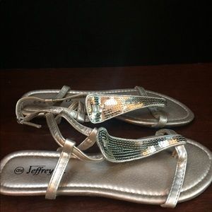 Gold sequin sandals.